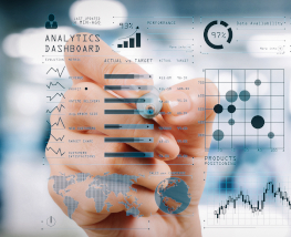 Intelligence (BI) and business analytics (BA) with key performance indicators (KPI) dashboard concept.business documents on office table with smart phone and digital tablet and graph on wide screen computer.